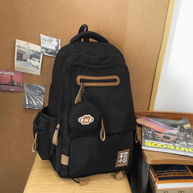 

Japanese leisure travel backpack spine protection large capacity junior high school high school students computer backpack tide чорний