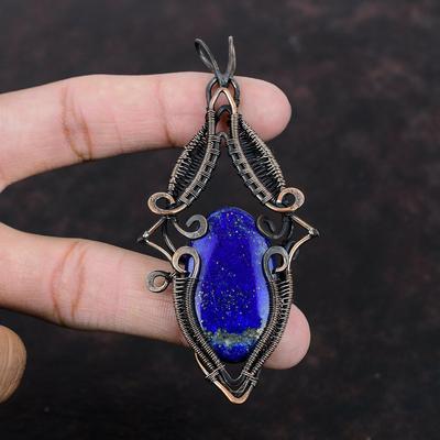 Wisiorek z lapisu lazuli Wisiorek owinięty miedzianym drutem Biżuteria z lapisu lazuli Ręcznie robiony wisiorek Biżuteria miedziana Wisiorek z kamieniem szlachetnym Na prezent Wisiorek boho