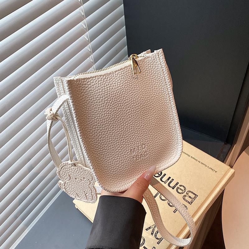 Korean version of simple vegetable basket bag women's 2025 spring and summer new fashionable versatile high-end sense portable shoulder messenger bag