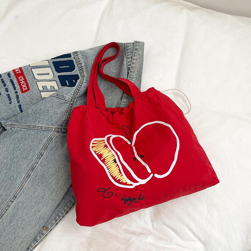 

2025 лето новая холщовая сумка на шнурке студенческая легкая универсальная на плечо нишевая большая вместимость простая красный