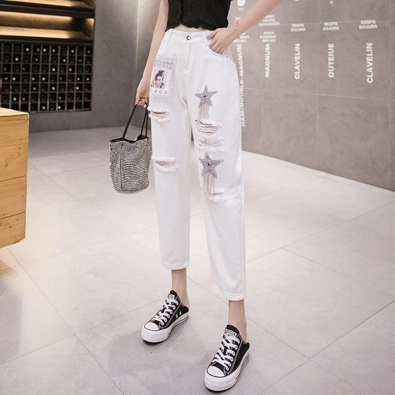 

Real Shot Spring New Women clothes Harem Pants Sexy Personalized Ripped Decals Denim Trousers Slim fit Slimming Preppy White 2XL
