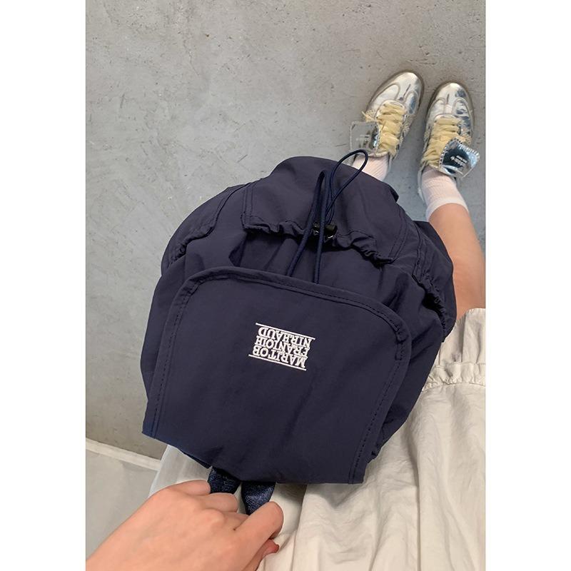 A Fashionable Letter Backpack with A Simple and Large-capacity Travel Bag