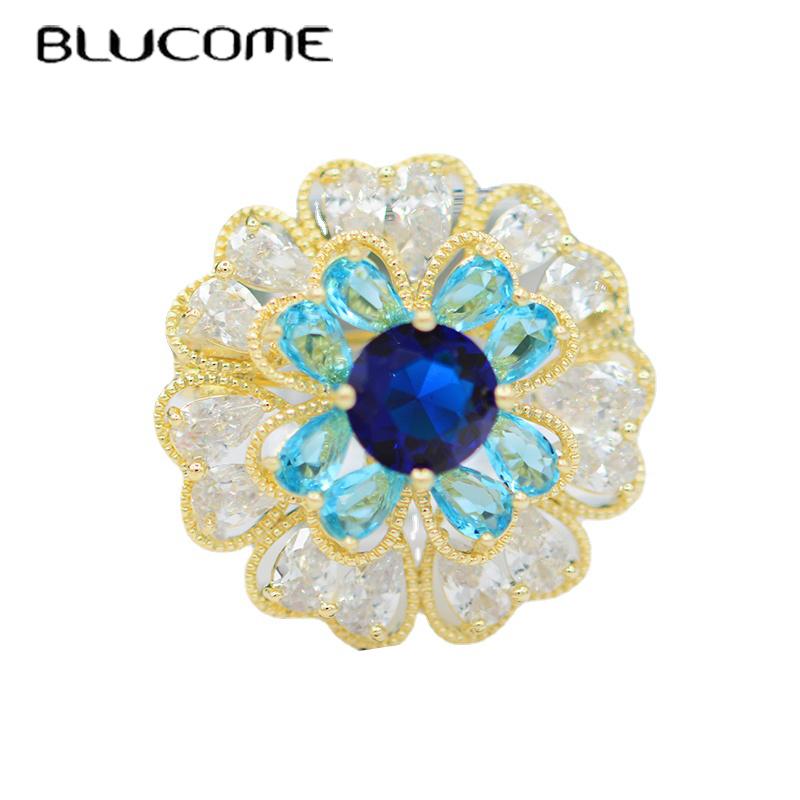 Blucome Luxury Fashion Flower Brooch Rhinestone Copper Pins for Women Weddings Party Office Corsage Lapel Pins Nwe Year Gifts