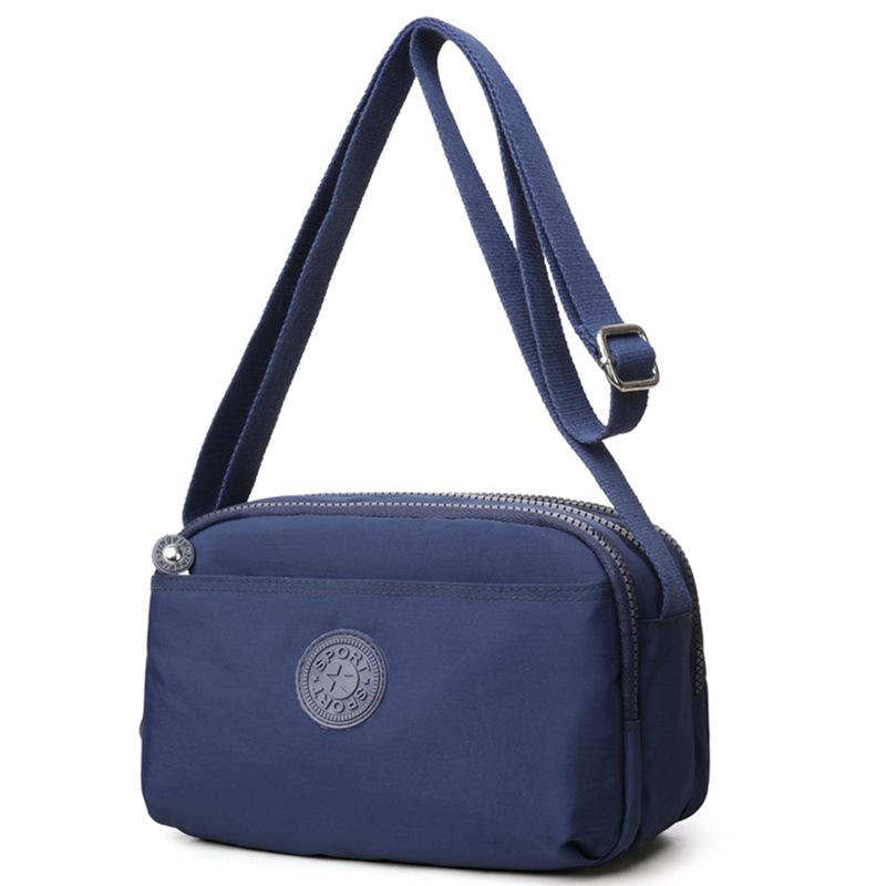 2025 Dámská lehká vícevrstvá vodoodpudivá crossbody taška s více kapsami