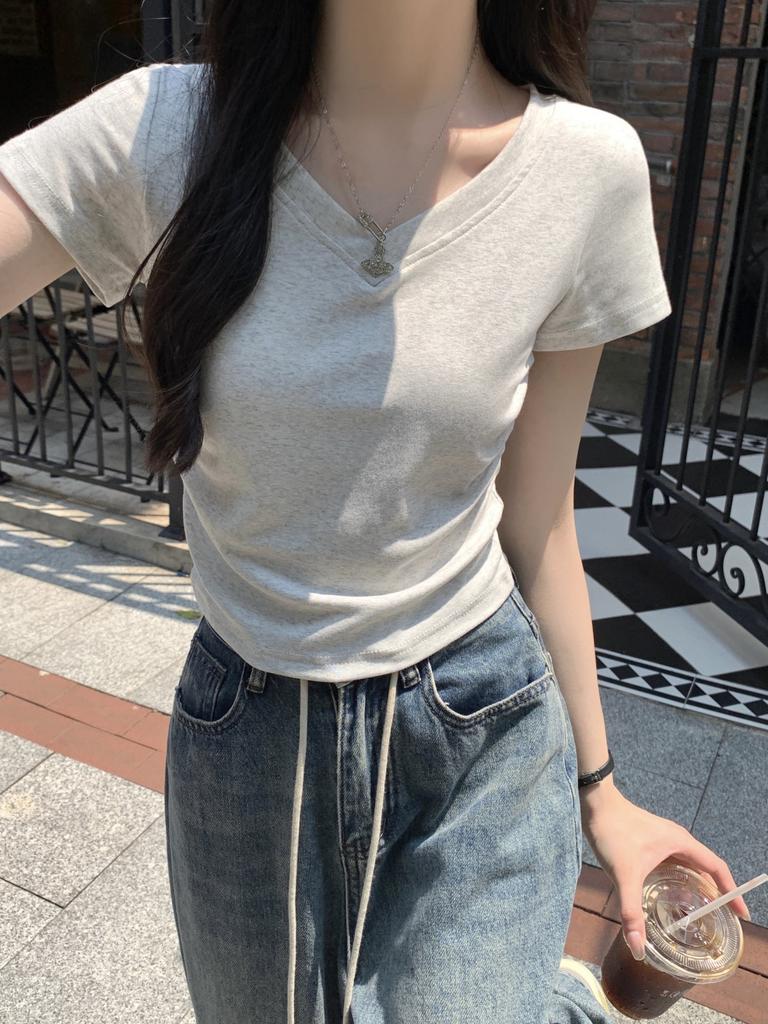 Short-sleeved T-shirt women's summer new Korean version slim and thin versatile v-neck design sense solid color front shoulder top trendy