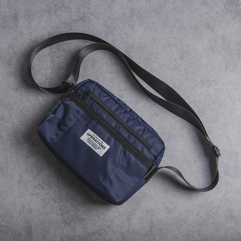 Herren Oxford Stoff Lässige Messenger Umhängetasche: Neuer Trend in der amerikanischen Street Fashion.