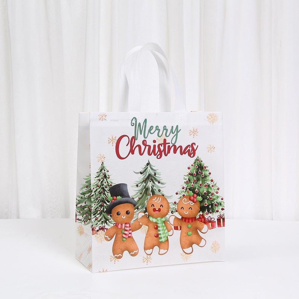 StoBag Christmas Gingerbread Non Woven Gift Bags Reusable Holiday Treat Bags for Party Favors Candy Cookies