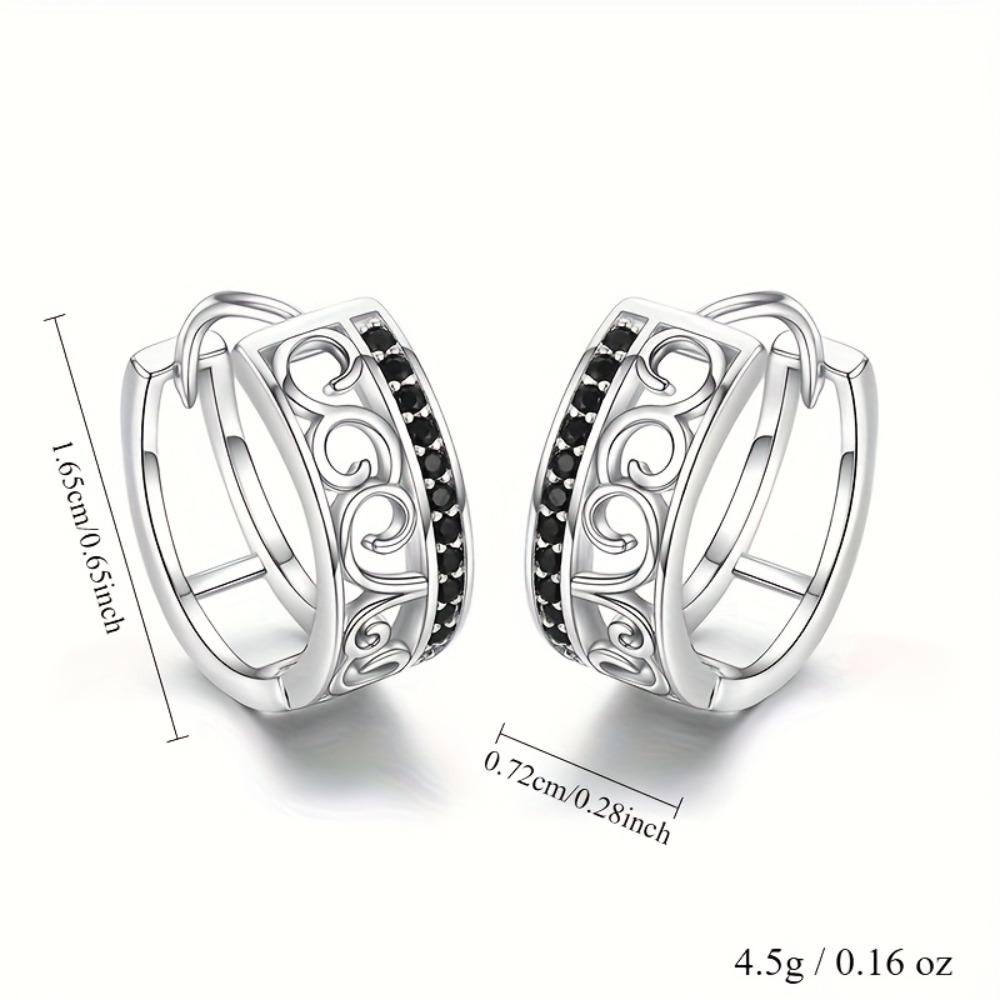 

Медные серьги-кольца с филигранным дизайном и акцентами из черного кубического циркония