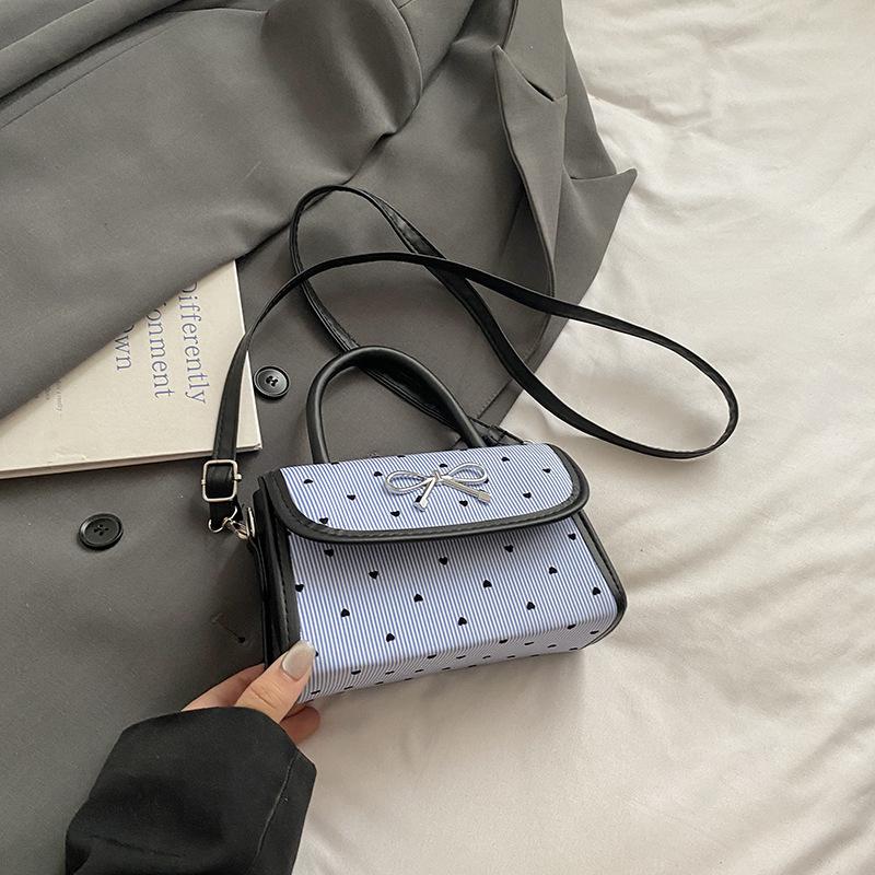 

Korean version niche bow bag women s 2025 new shoulder messenger bag high-end polka dot portable small square bag