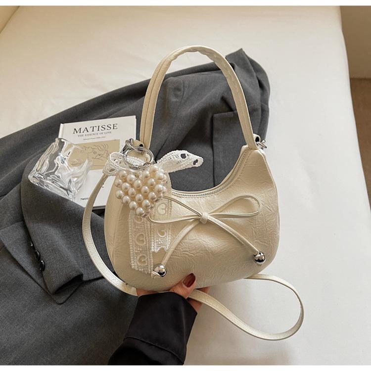 Niche Bow Hand Carry Crescent Moon Bag Women's 2025 New Fashion Simple Shoulder Armpit Bag Shoulder Messenger Bag