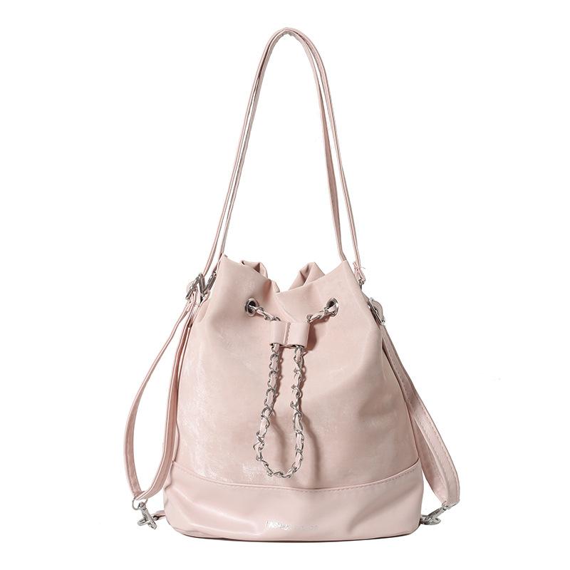 

Персоналізований ланцюжок, дизайн в іноземному стилі, модний жіночий рюкзак на шнурку 2024 новий простий та місткий кросбоді сумка-відро рожевий