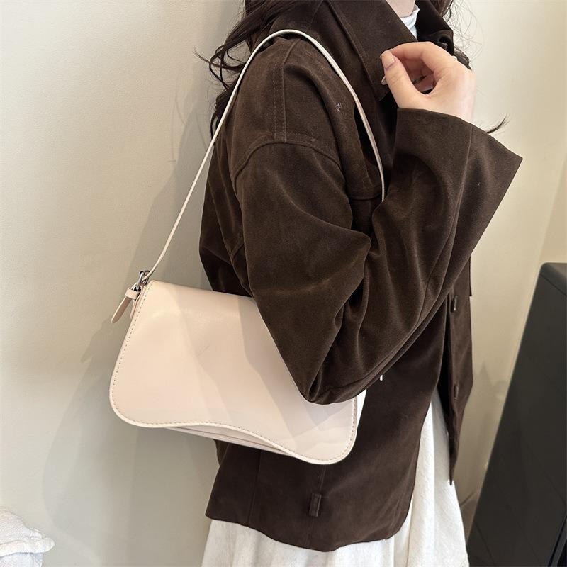 Simple and fashionable spring new armpit bag trend casual personality solid color work commuting shoulder bag