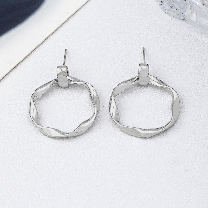 European and American personality simple geometric earrings women irregular retro circle stud earrings niche light luxury Internet celebrity earrings