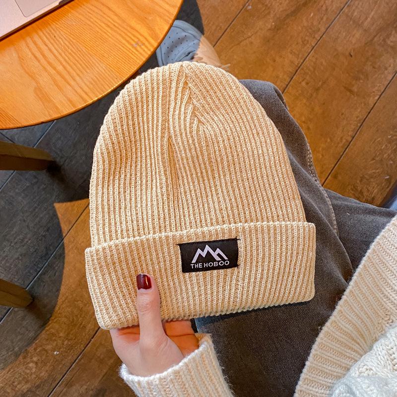 Japanese Trendy Woolen Hats: Unisex Knitted Beanies with Ear Protection for Autumn and Winter