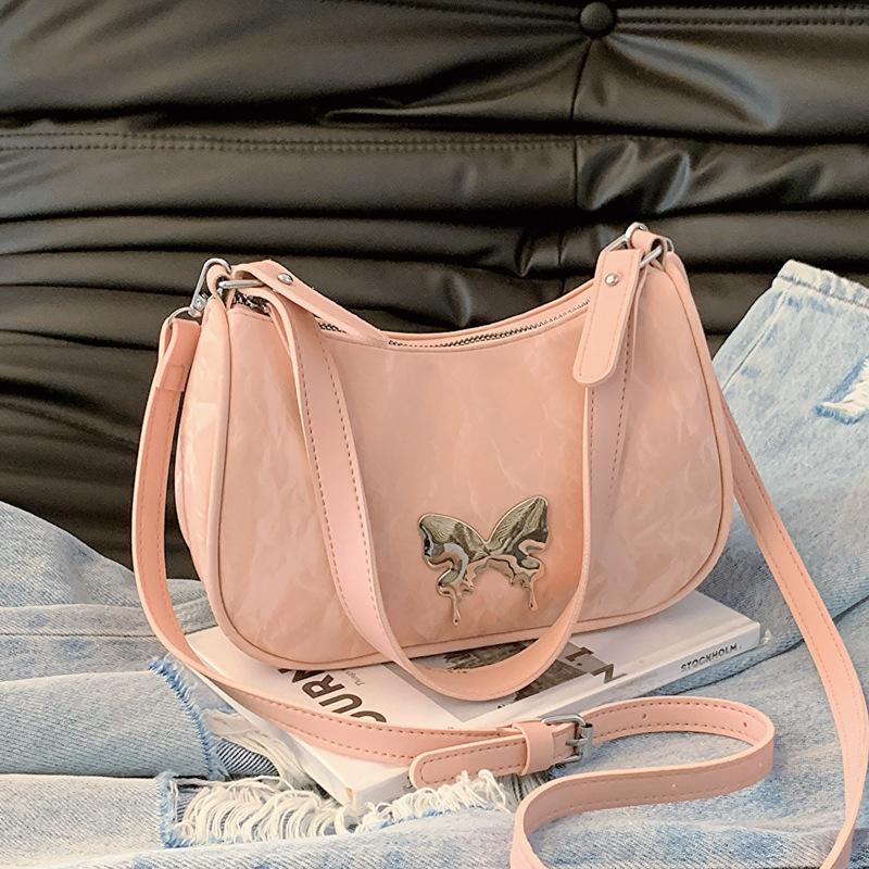 

Foreign-style niche bag women s 2024 new popular aesthetic chain messenger bag personalized casual shoulder armpit bag рожевий