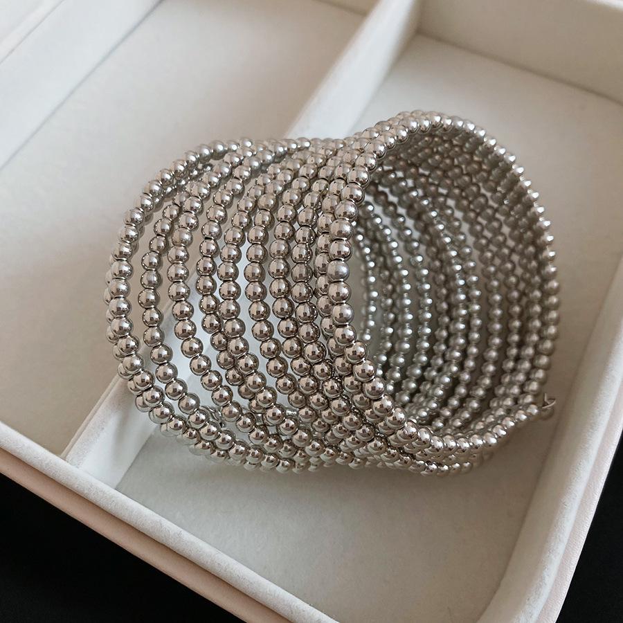 Elegantes mehrschichtiges geometrisches Armband: Luxuriöser, Personalisierter Design- und Kühner Grenzüberschreitender Statement-Schmuck