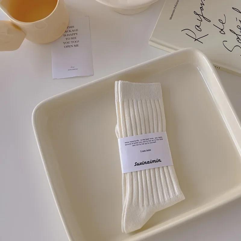 Chaussettes en Tricot de Coton pour Femmes Style Japonais Chaussettes Hautes pour Écolières Mode Coréenne Couleur Unie Noir Blanc Gris Chaussettes Longues