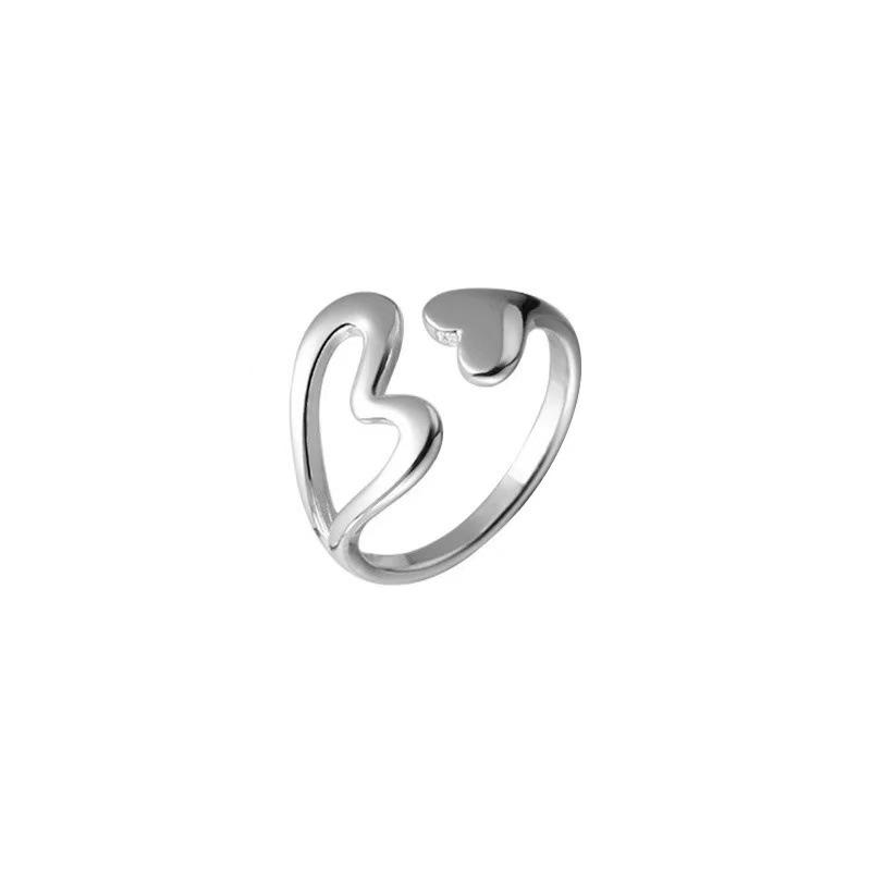 2025 Women's Adjustable Hollow Heart Ring: Stylish & Personalized Design