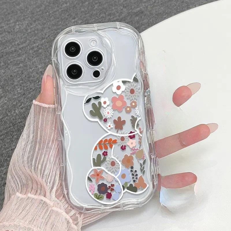 Vibrant flower bear is suitable for Apple 16promax mobile phone case, transparent iPhone17 airbag anti-drop protective case.