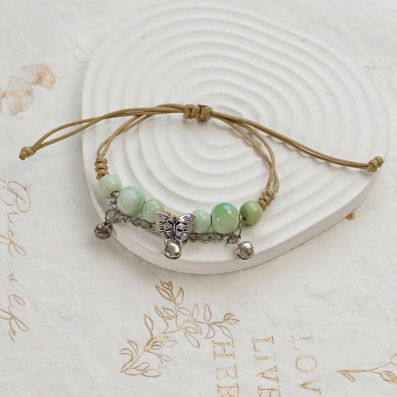 Bracelet Papillon Coloré en Céramique Fait Main Bracelet à Cordon Tressé Réglable Doux Accessoires de Mode Uniques Cadeaux