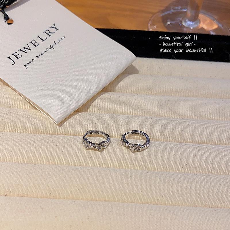 

Стильные серьги-бантики с микроинкрустацией из циркония для женщин — модный универсальный стиль знаменитостей E6117 серебряный