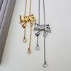 Oscar Gold-Plated Retro Bow Pendant Necklace - Minimalist Women's Design