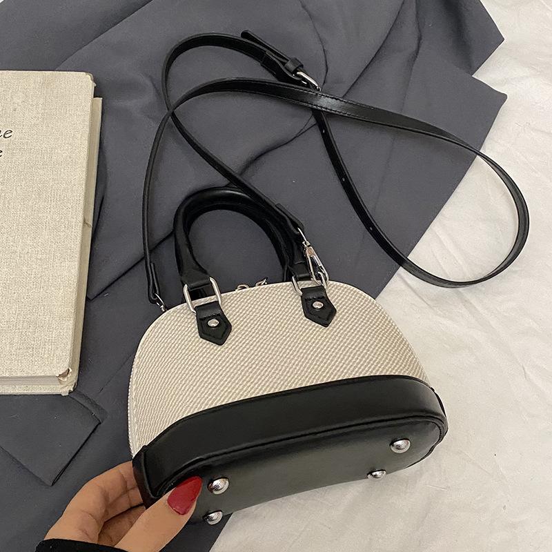Korean Version of Niche Retro Style Contrasting Colors Splicing Portable Shell Bag Temperament Versatile Advanced Texture Commuter Messenger Bag Women