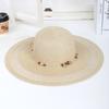 New Spring and Summer Fashion Strap Hollow Straw Hat Outdoor Casual Wind Hand-woven Sun Hat Women's Seaside Beach Hat