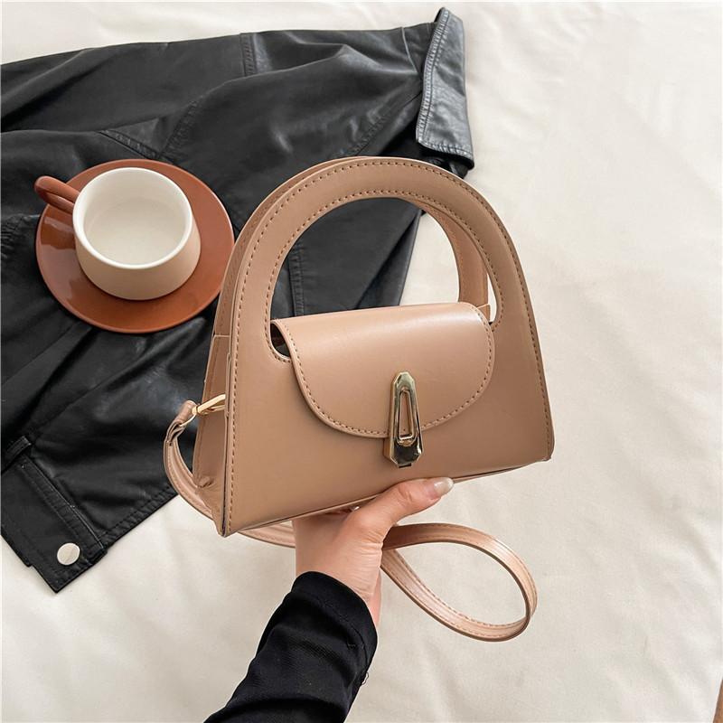 

2025 summer new semi-round bag women s solid color commuter retro lock handbag trendy and foreign casual messenger bag хаки