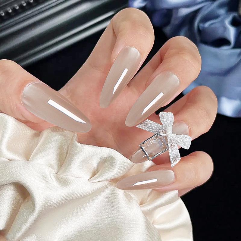 

Long Almond Cat Eye Nude Nail Art: 24-Piece Wearable False Nail Stickers Glue Kit