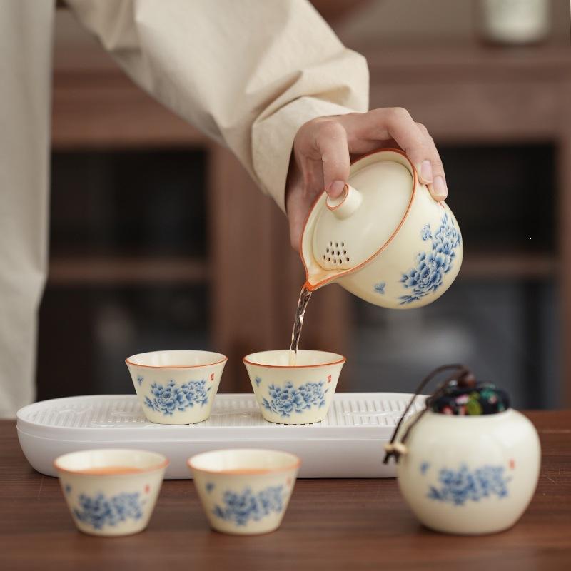 High-value peony travel Qingyun small set Huang Ru kiln business trip Kung Fu teacup portable leather bag gift