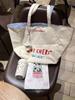 Niche design alphabet canvas bag women's 2025 new retro versatile large-capacity shoulder tote bag