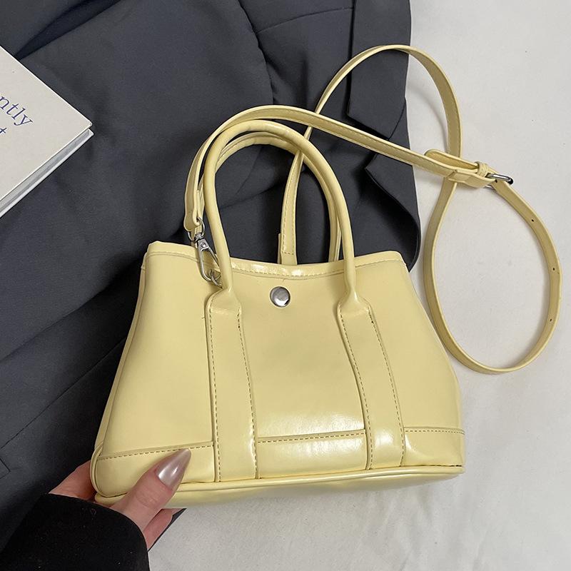 Korean New Product Sweet Cream Style Casual Portable Small Bag Temperament Versatile Simple Solid Color Commuter Messenger Women's Bag