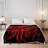A Surreal Red Figure Entwined with Chaotic, Monstrous Shapes On Black. for All Seasons Blanket Lunch Break Throw Gift