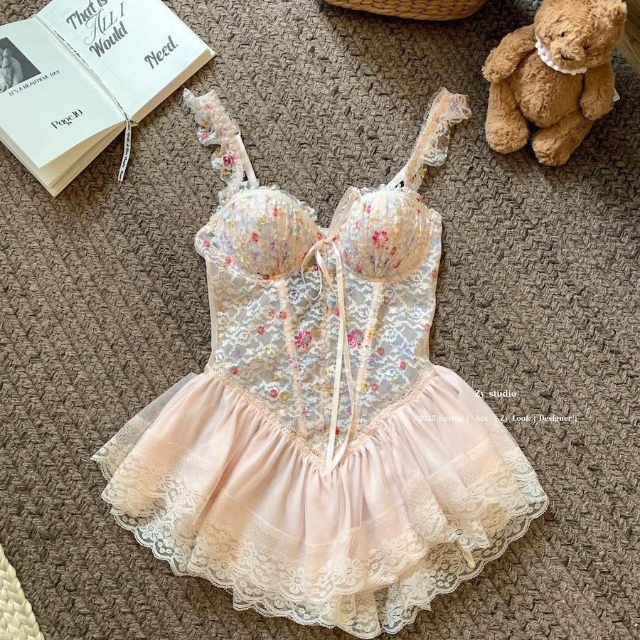 This Classic Corset-style Lingerie Set Features Embroidery, Lace, Fringe, and Lace-up Details, Crafted In An Exotic Uniform-inspired Design.