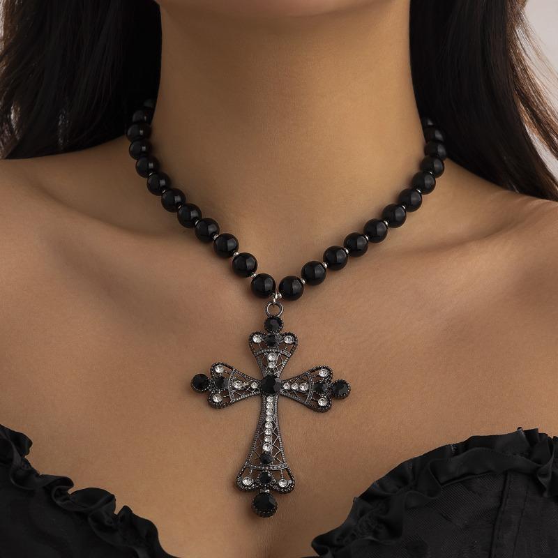 Punk style cross necklace - dark, statement-making, micro-paved faux pearl layered necklace