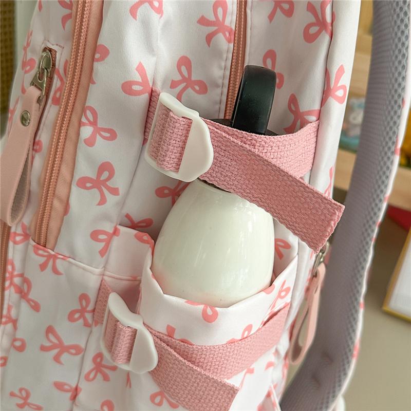 Cute Bow Print Backpack for Women Lightweight Casual Daypack Travel School Bag with Multi Pockets