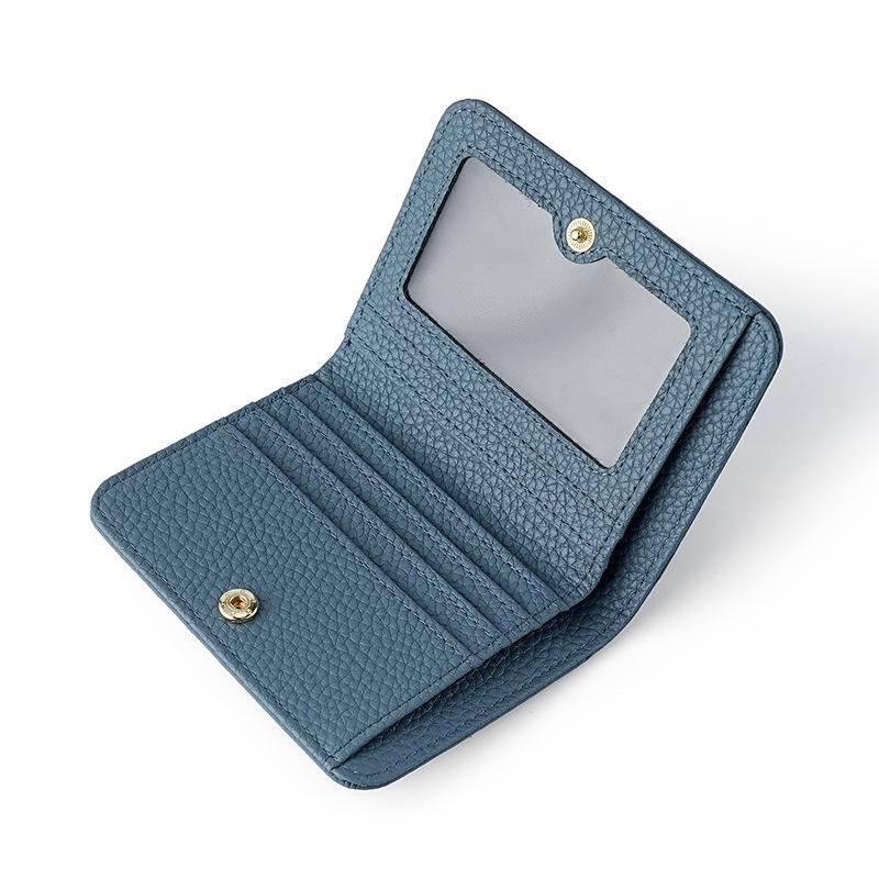 

Женский кошелек из натуральной коровьей кожи 2024 года — небольшой, портативный, с блокировкой RFID, отделениями для нескольких карт и монетницей на кнопке