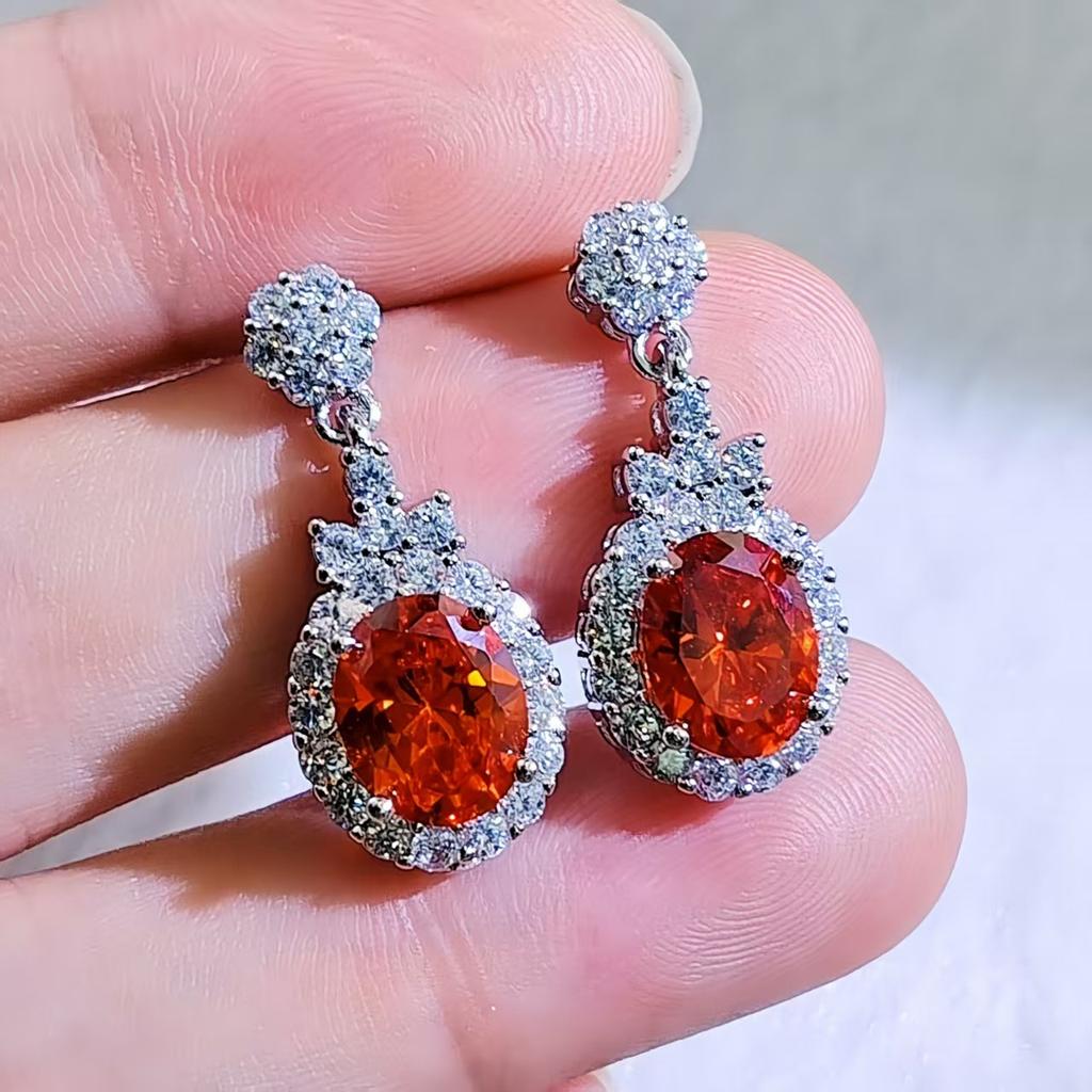 Fashion jewelry: full of diamonds, oval flower studs, exquisite temperament, earrings, light luxury, high-end earrings