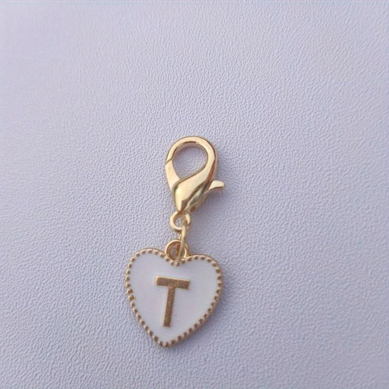 Hetsäljande 26 engelska bokstäver vit dubbelsidig persikohjärta nyckelring hjärtformad legeringsaccessoarprydnad