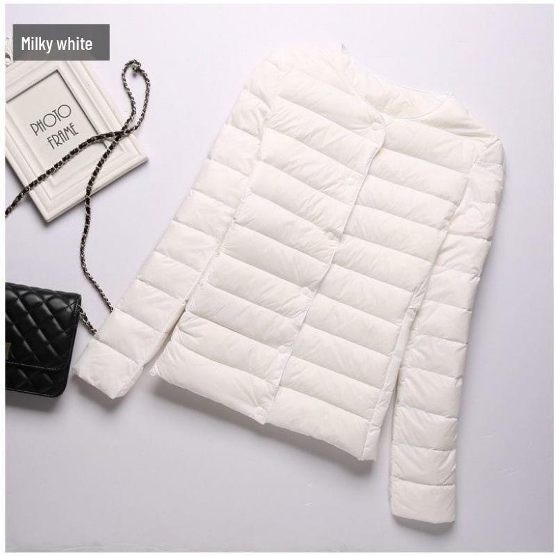 

Женский жилет без воротника с 90% белым утиным пухом: Легкий, Короткий, Без рукавов, Круглый вырез, Большого размера, Идеально подходит для осени и зимы. 4XL (150-165 jin)