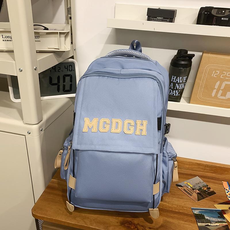 Schoolbag Japanese new solid color simple campus junior high school schoolbag Korean version girl backpack women's large capacity travel backpack