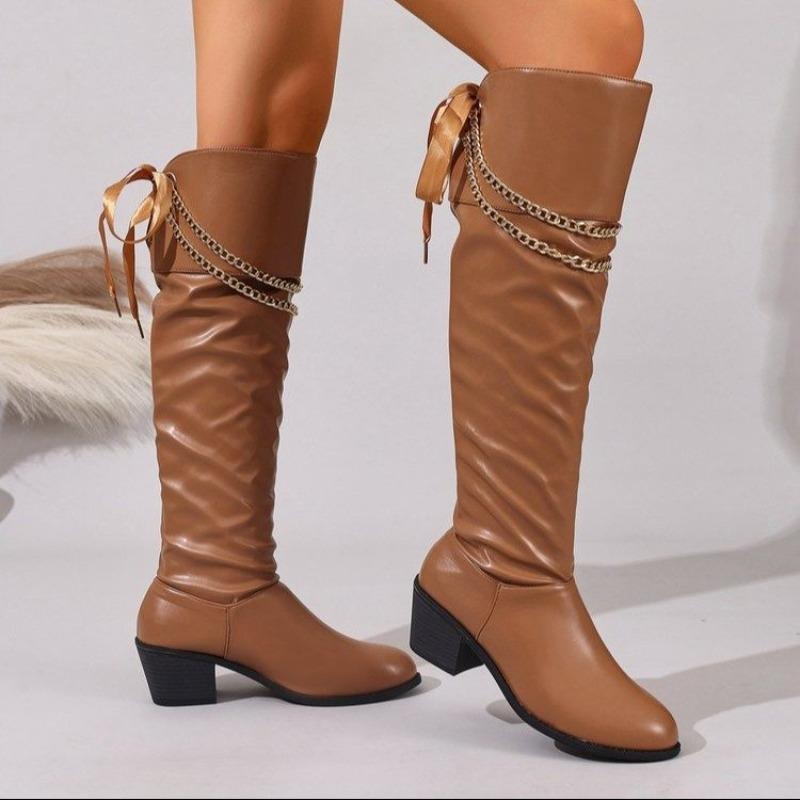 Nowy styl butów jeździeckich damskich na jesień/zimę 2025: retro metalowy łańcuch szpiczasty nosek, gruby obcas, kozaki do kolana