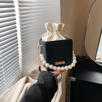 Hand Carry Pearl Bucket Bag Women's 2025 New Simple and Fashionable Spring Shoulder Bag Niche Design Texture Messenger Bag