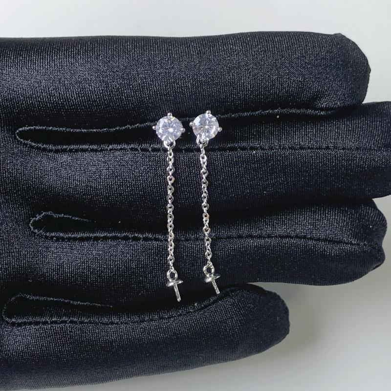 

Pearl Tassel Earrings: Elegant Studs with Unique Geometric Design