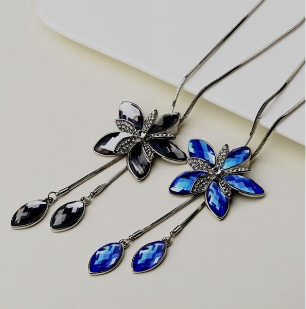 Japan and Korea fashion symmetrical crystal symmetrical sweater versatile necklace five-petal flower pendant accessories crystal exquisite