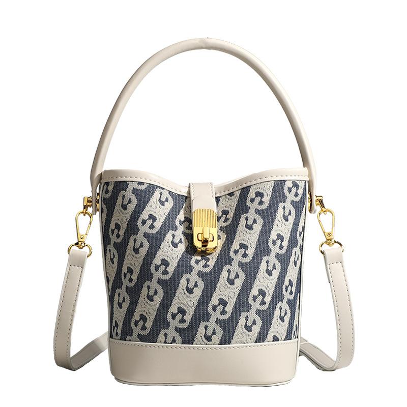 New Niche Design Simple Canvas Bucket Bag Versatile Large Capacity Commuter Portable Shoulder Messenger Bag Handbags