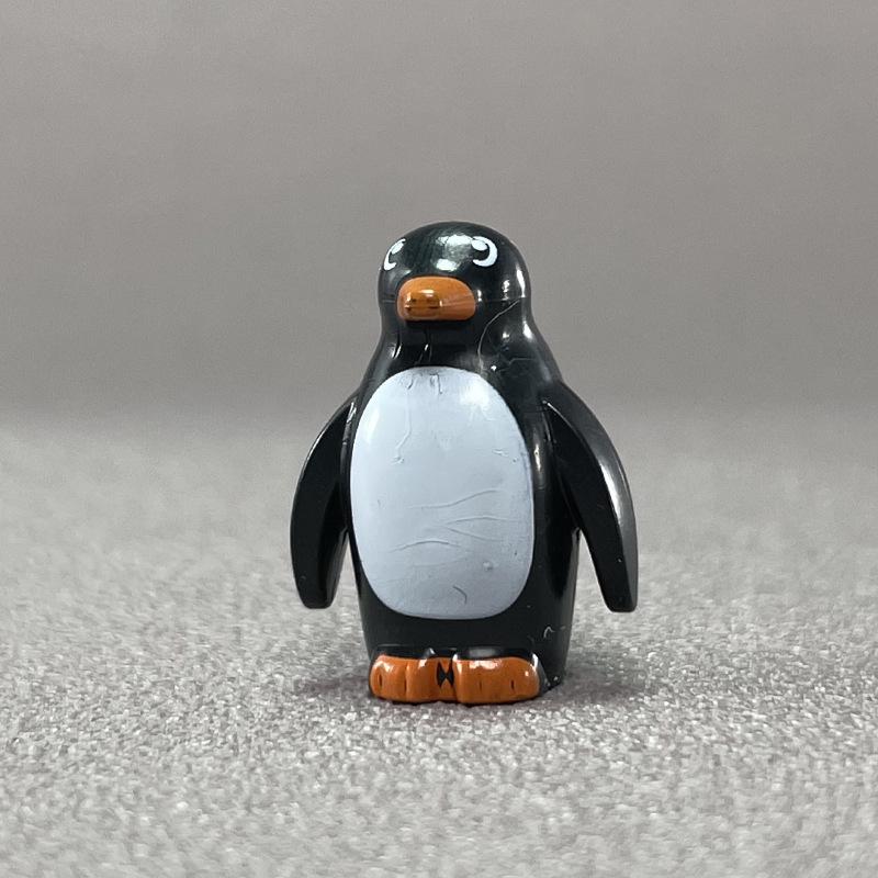 Beleuchtetes arktisches Tier-Baustein-Set: Pinguin, Eisbär, Husky & Wolf Iglu.