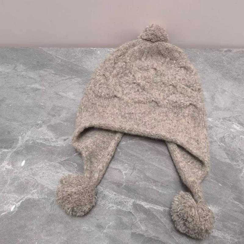 Męskie i damskie jesienno-zimowe nowe modne czapki urocze ciepłe dziergane czapki na uszy wełniane z domieszką wełny odmładzające żakardowe czapki wełniane