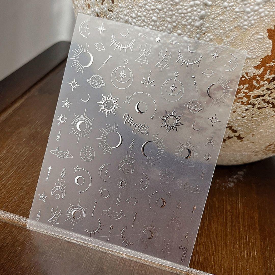 

Наклейки для ногтей Взрыв Звезды, Луны и Солнца - Клейкие, Полые, Горячее тиснение для DIY-маникюра Silver Stamping w/ Premium Packaging